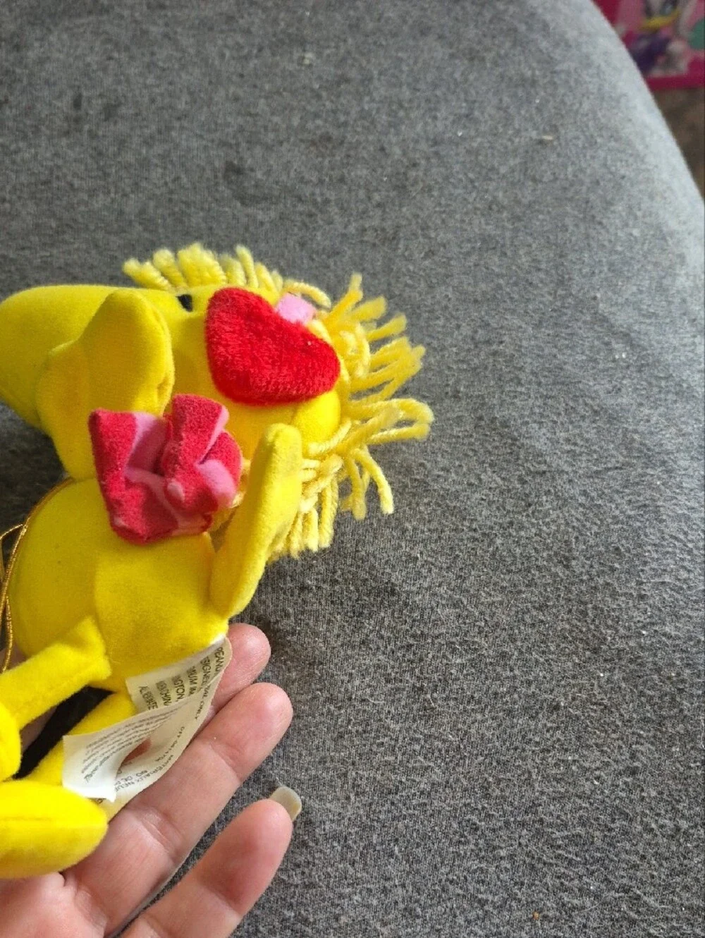 Peanuts Yellow Woodstock Plush with Pink Strap and Red Heart Earmuffs